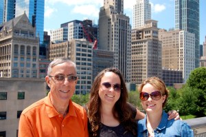 Three of the Timmses with the Chicago skyline