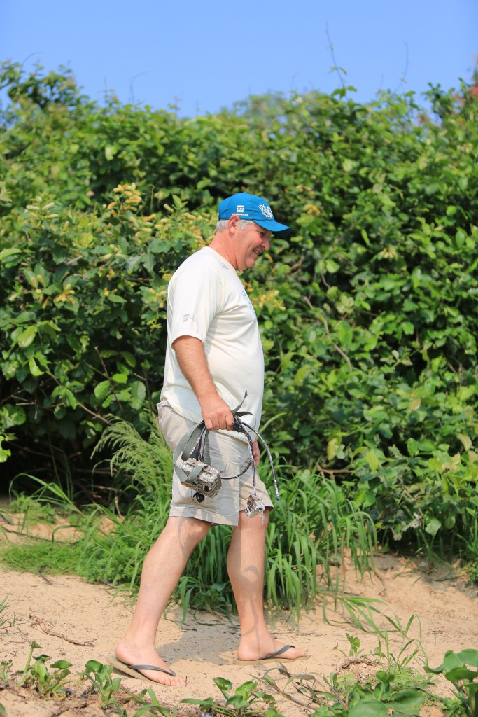 Douglas retrieves the night camera