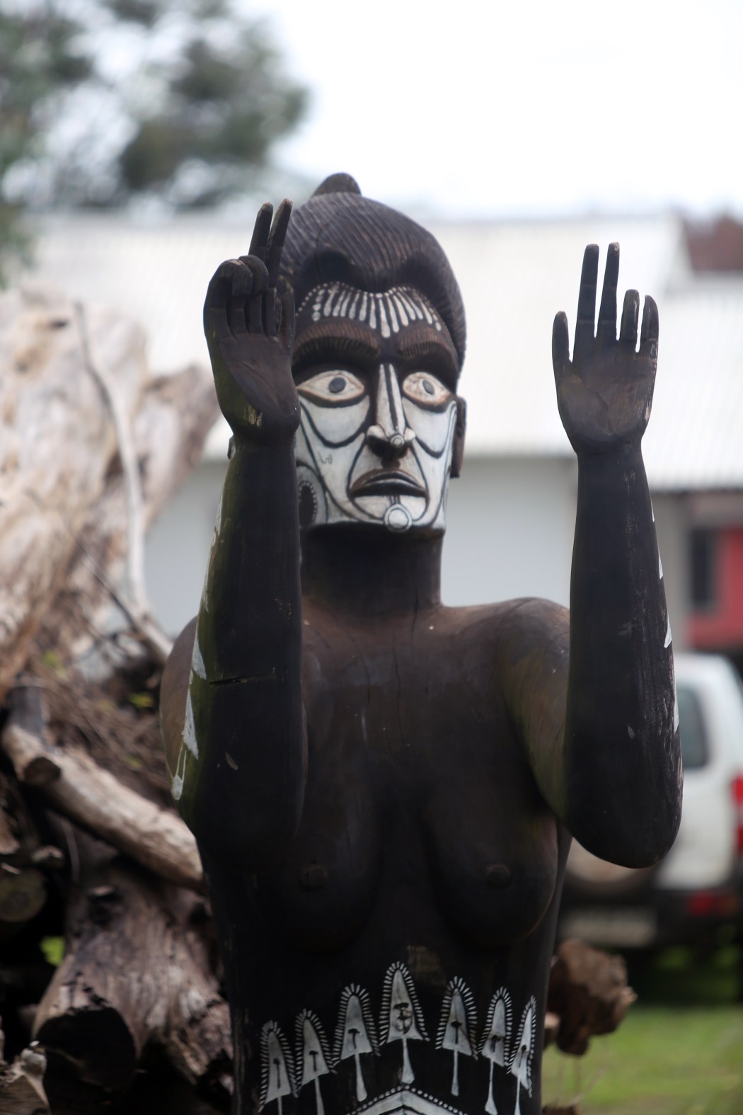 A statue outside of a souvenir shop